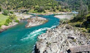 River rapids with rocks on the side